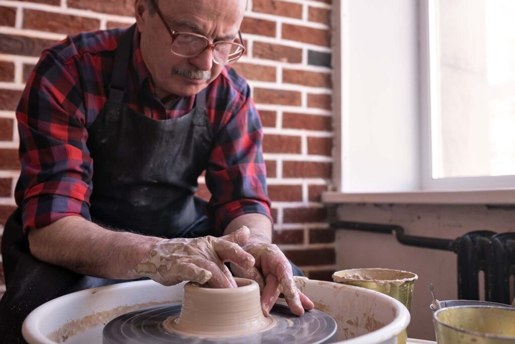 Regain your creative spark! Senior enjoys pottery after facet injections relieve neck pain at California Sports & Spine.